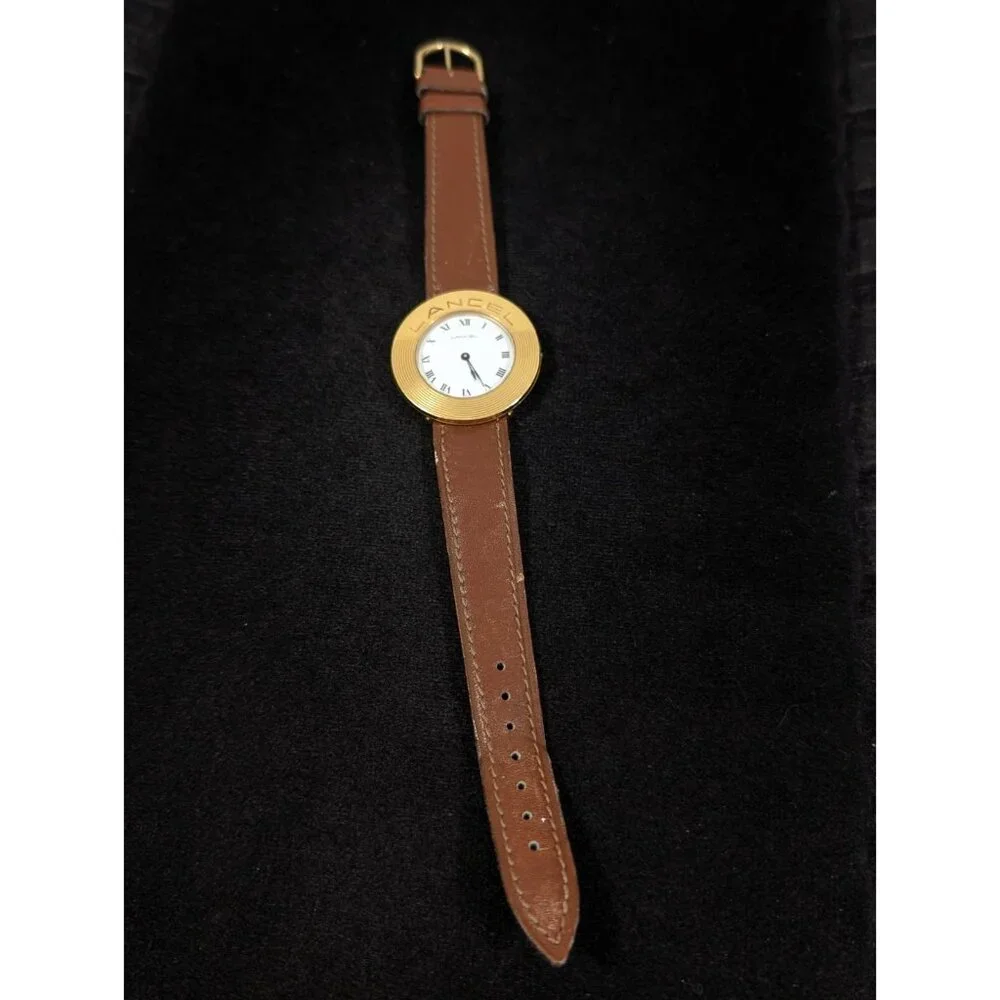 Vintage Lancel‎ Paris Gold Tone Round Case Brown Leather Band Watch
